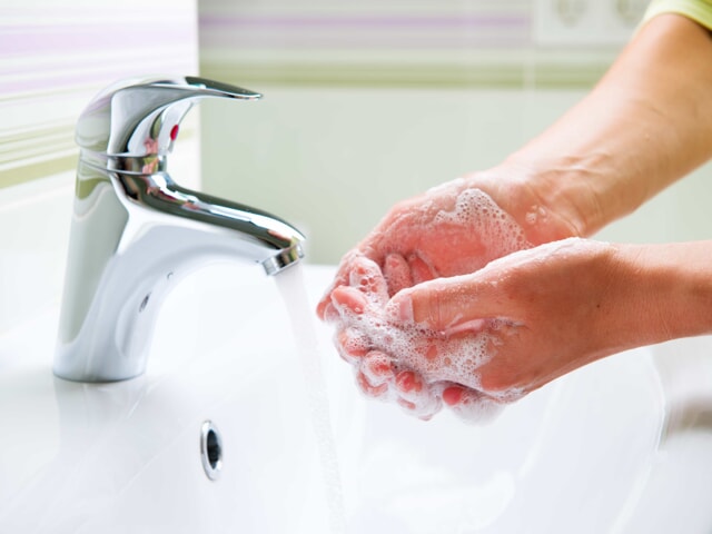 Hands being washed